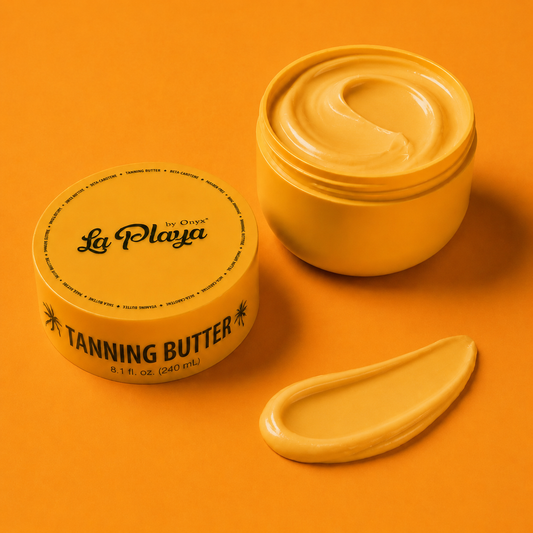 A jar of La Playa by Onyx Tanning Butter shown open with a swirl of golden-yellow cream inside, alongside a dollop of the tan balm on a solid orange background.